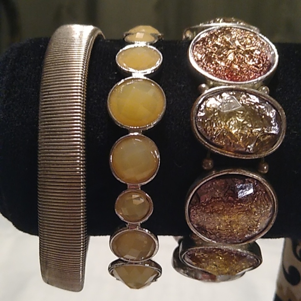 3 Yellow and Gold Tone Bracelets